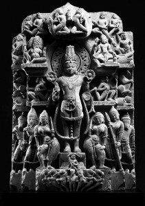 Central Āditya implicitly identified with Viṣṇu; flanked by Brahman and Rudra