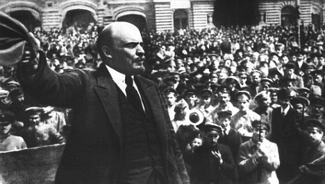 Founder of Soviet Russia Vladimir Ilyich Lenin, addresses soldiers of the new Soviet Army in Red Square in Moscow on May 25, 1919. The building in background is the Gum Department Store. (AP Photo/TASS)